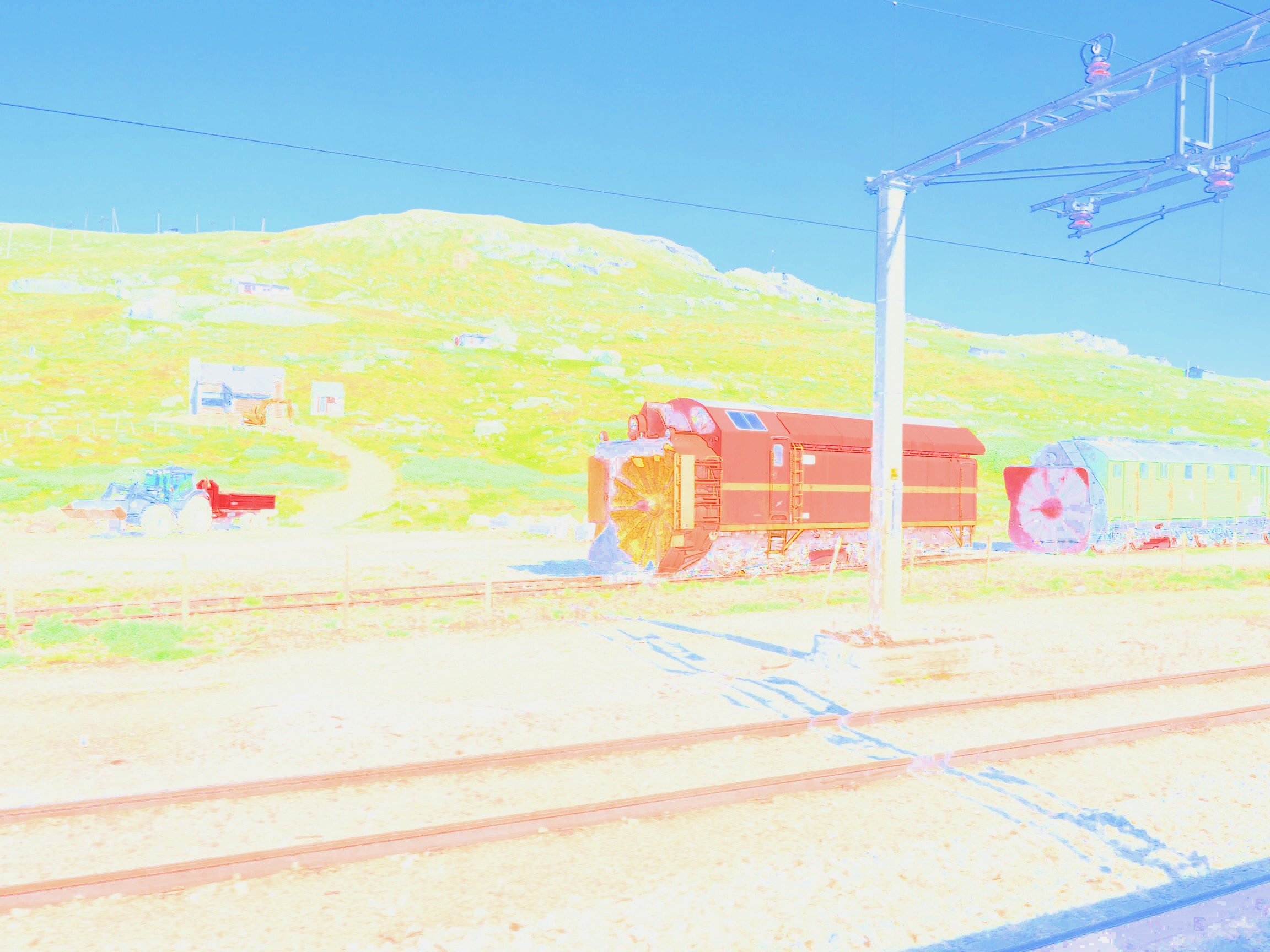 Rail snowblowers on the Oslo-Bergen railway in Norway. Photo has intensity component removed.